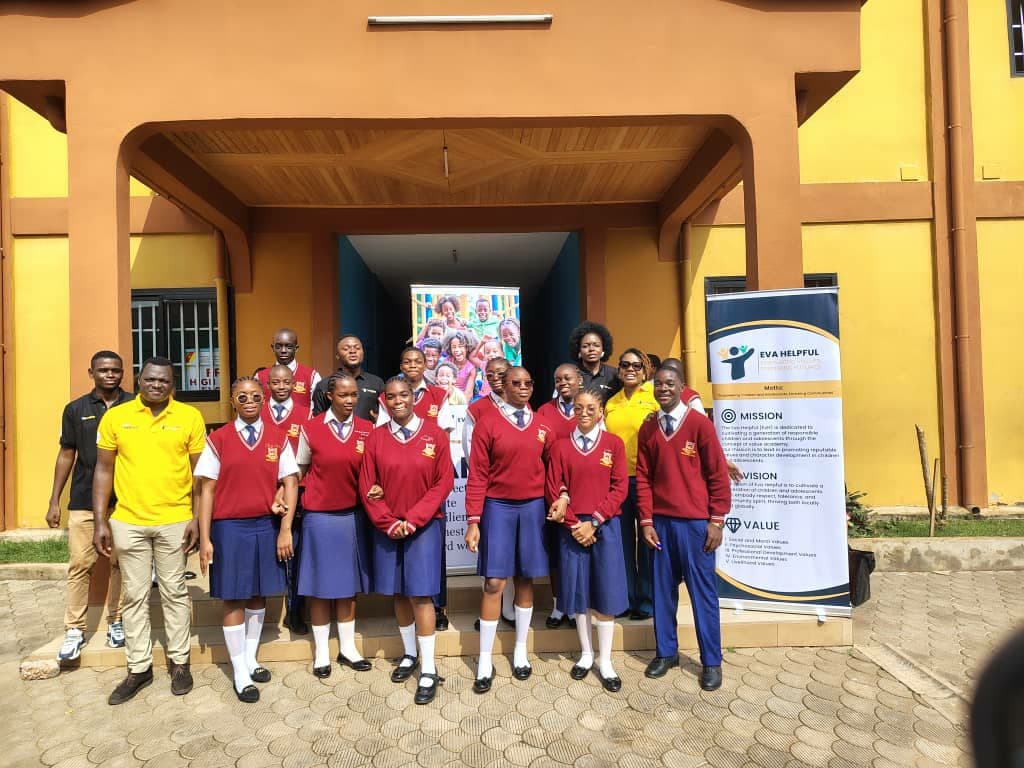 Eva Helpful Foundation school outreach group photo with students and volunteers